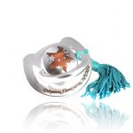 Baby pacifier coated with copper, silver-plated in silver solution 999° and egraved by laser
