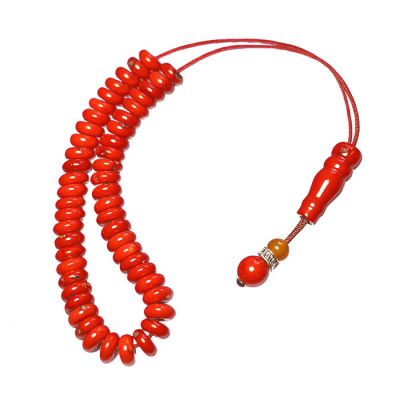 Worry bead, made of red coral beads.